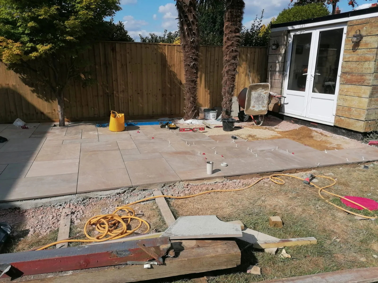 Large-format slabs being installed with spacers