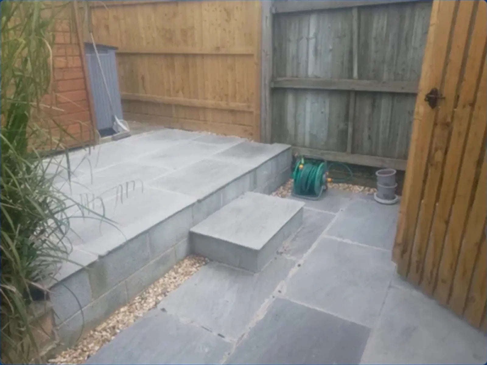 Block-supported raised patio and steps